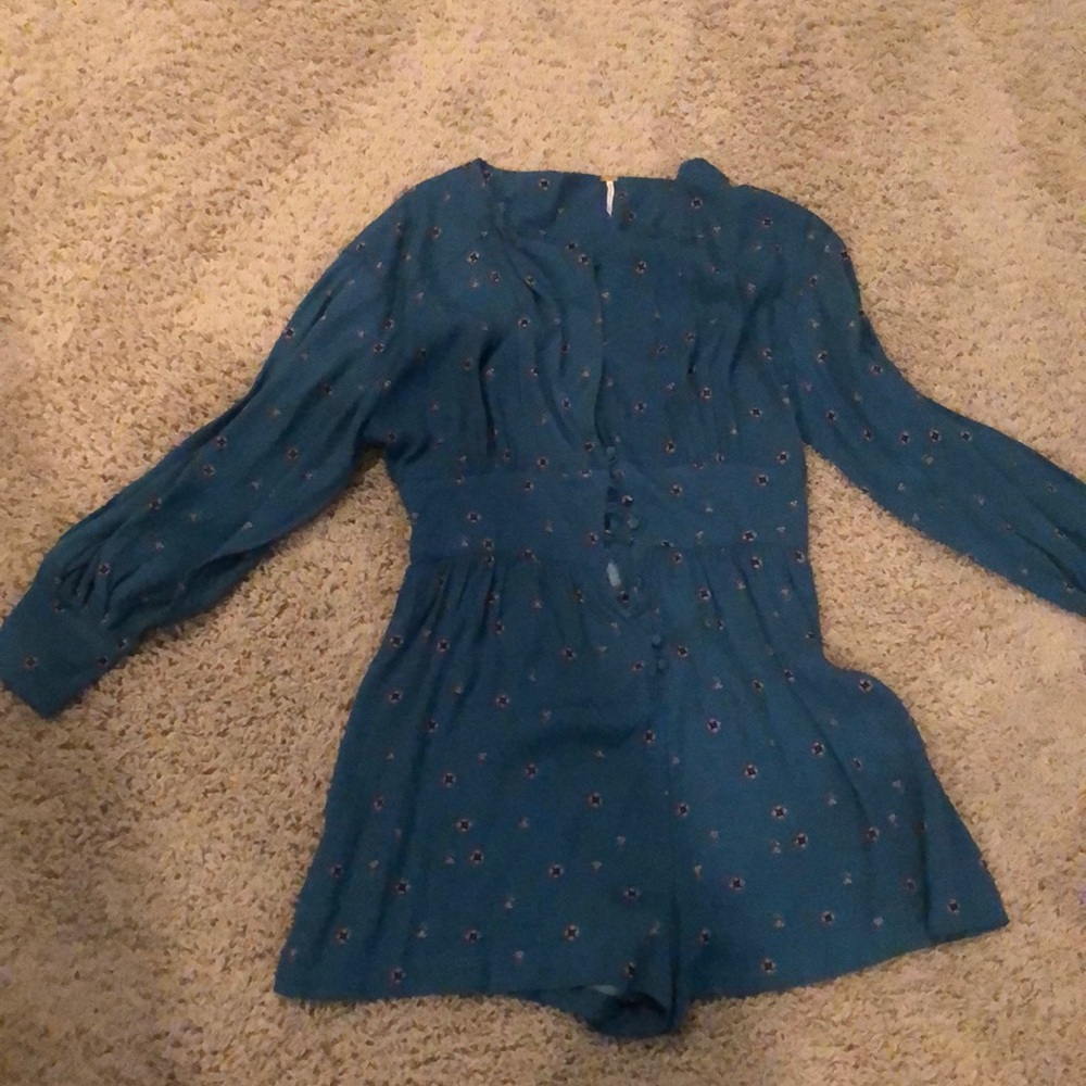 Green long sleeved romper
